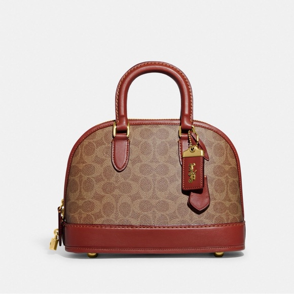 Coach Handbags - Coach Revel Bag in Signature Canvas